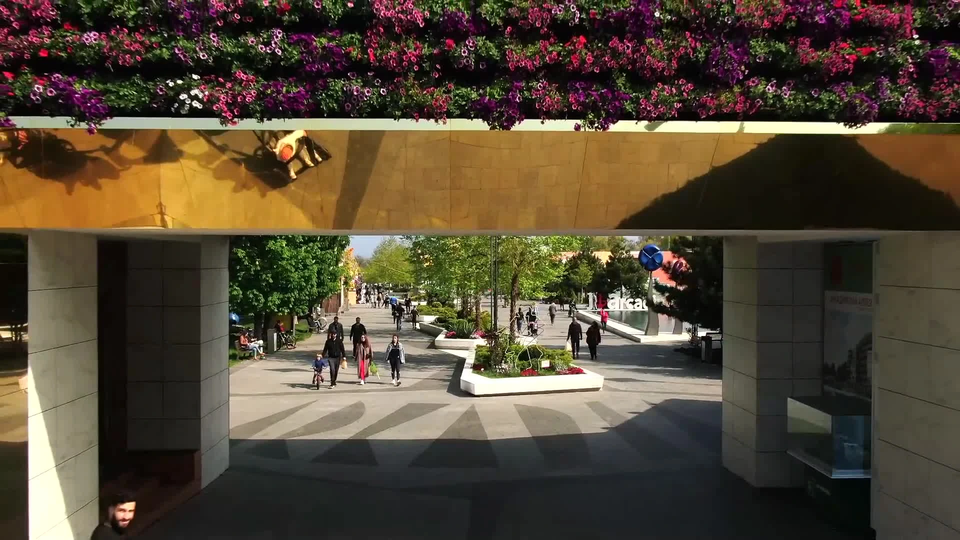 Arcadia — the view through the entrance into the pedestrian space. Project film still.