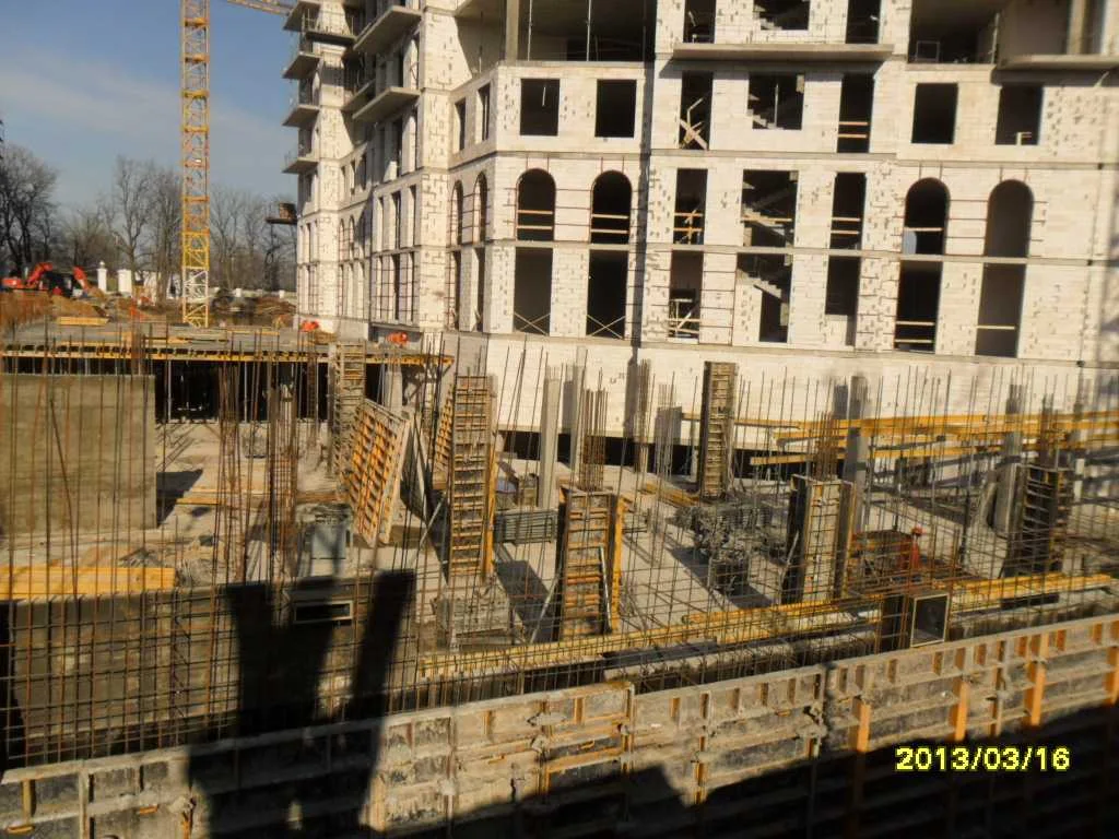 Shared office and hospitality estate: concrete works in front of the existing building. Site report, 2013.