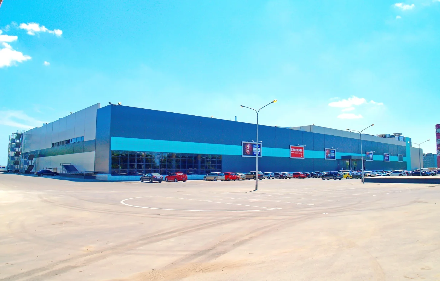 City Center: the completed shopping-centre exterior and approach. Retained company-portfolio photograph.
