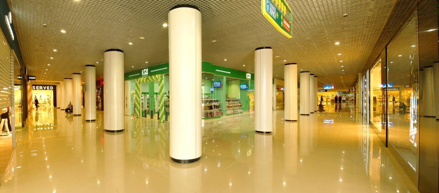 City Center: internal shopping circulation and storefronts. Retained company-portfolio photograph.