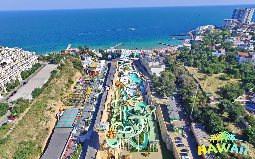 Hawaii aquapark: the leisure complex in its coastal setting. Company-portfolio photograph; the portfolio role concerns the envelope package.