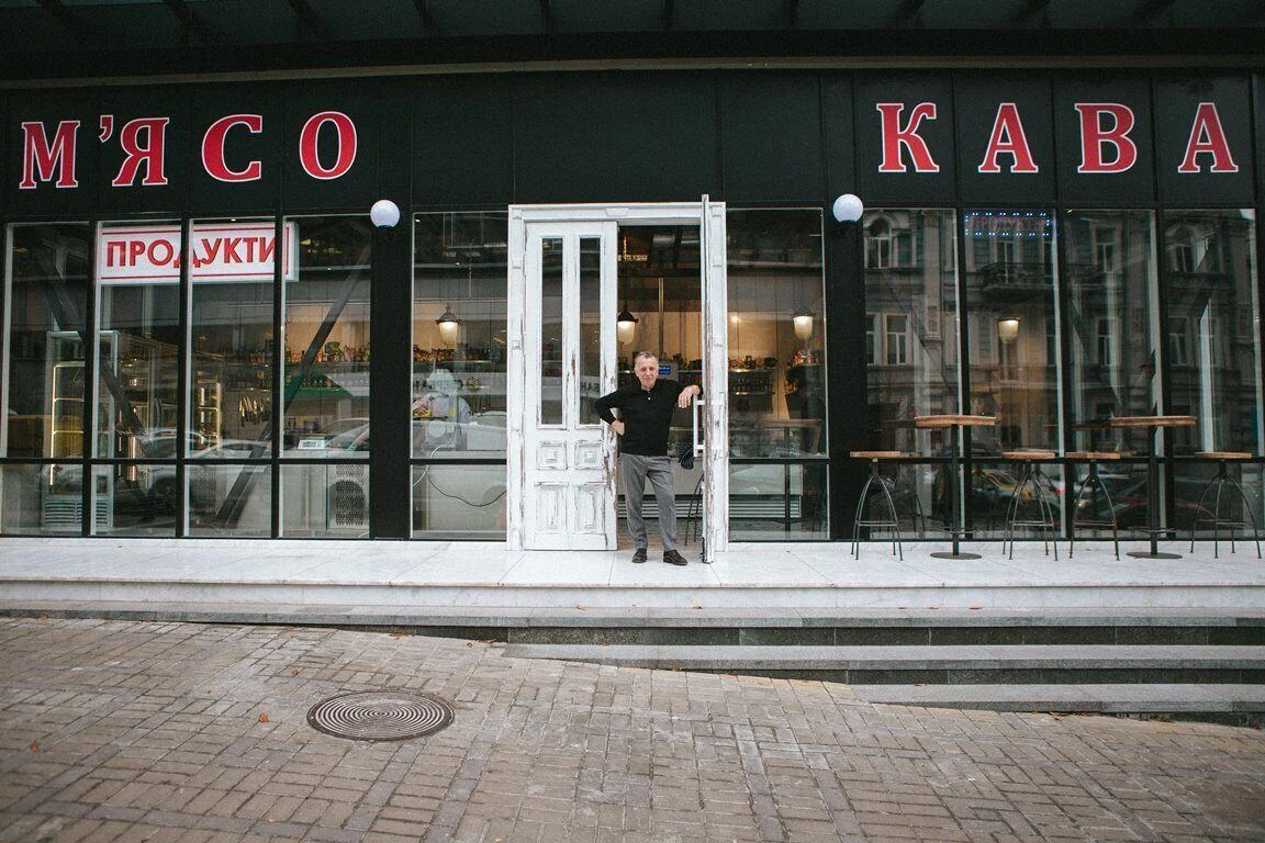 Steakhouse Kyiv: the glazed street entrance and restaurant signage. Project photograph; interior and architectural design by the appointed team.