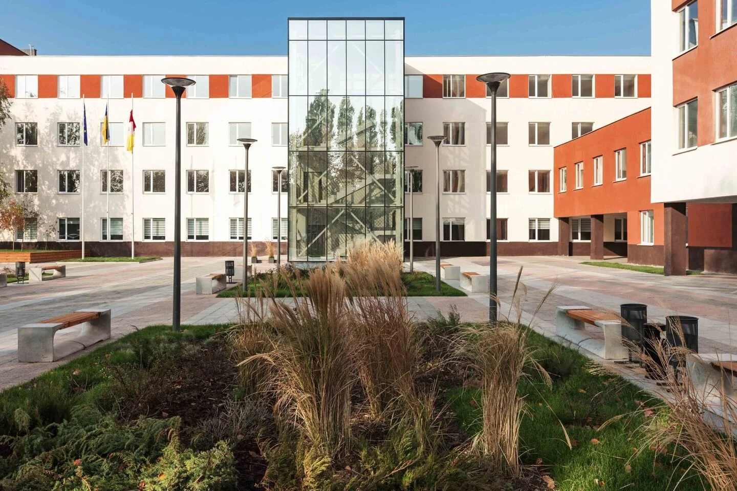 Municipal services complex: the glazed vertical circulation within the wider courtyard elevation. FES project photograph.