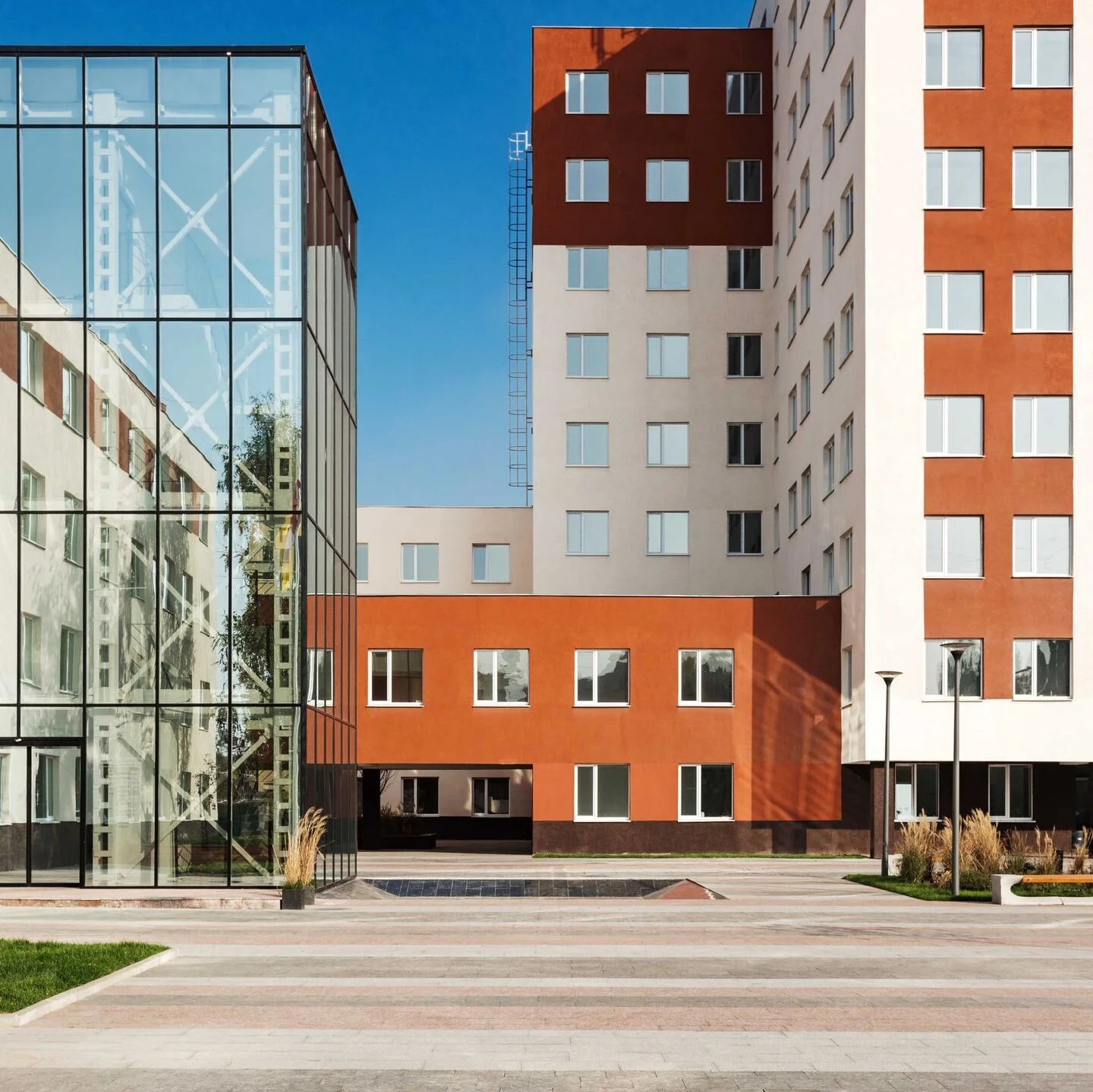 Municipal services complex: the external glazed lift and stair structure. FES project photograph.