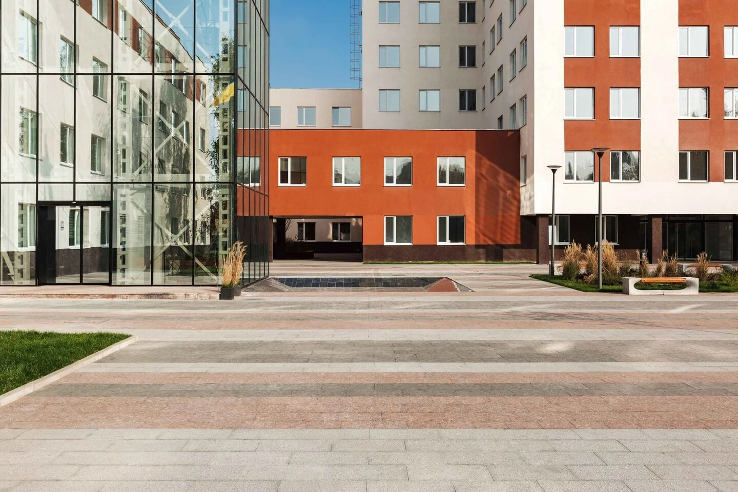 Municipal services complex: the entrance court and glazing at the base of the vertical enclosure. FES project photograph.