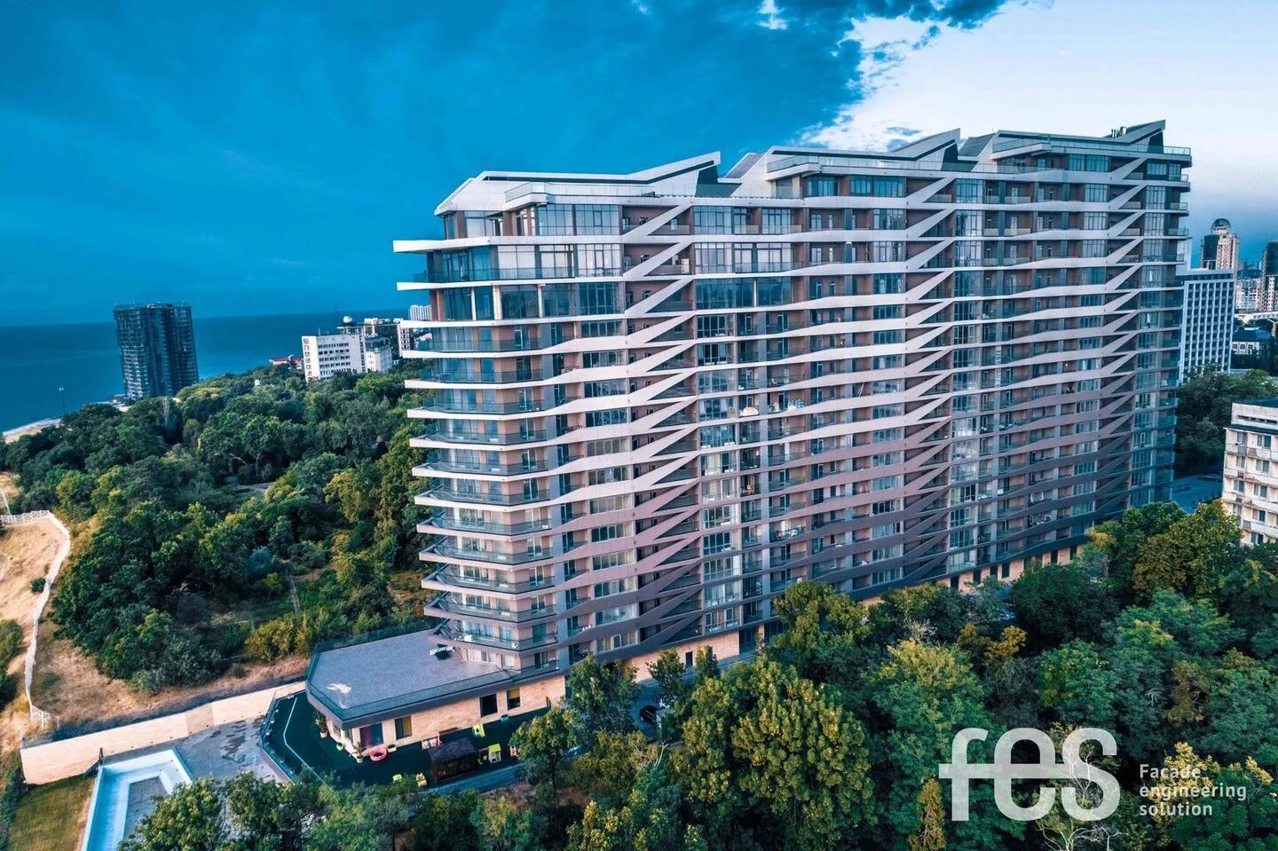 GreenWood: the building’s coastal setting and diagonal façade shading. FES project photograph.