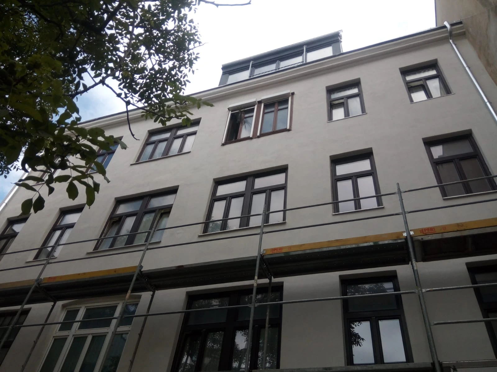 Grundsteingasse — renewed street façade at completion.