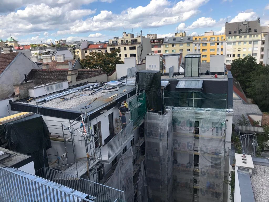 Grundsteingasse — completed upper-level construction and courtyard interfaces.