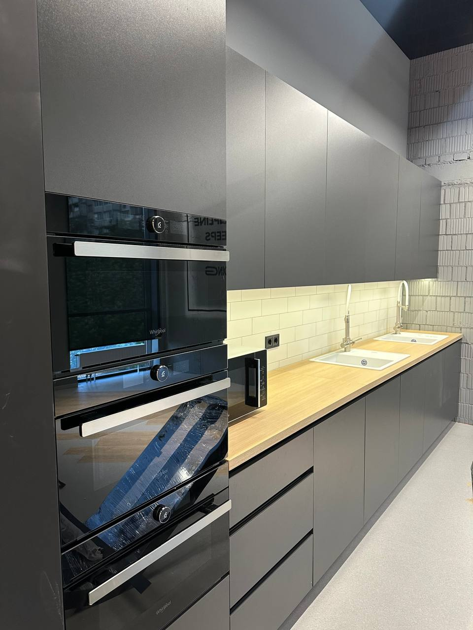 The shared kitchen. Netpeak Group Kyiv office. Project archive photograph, received July 2025.
