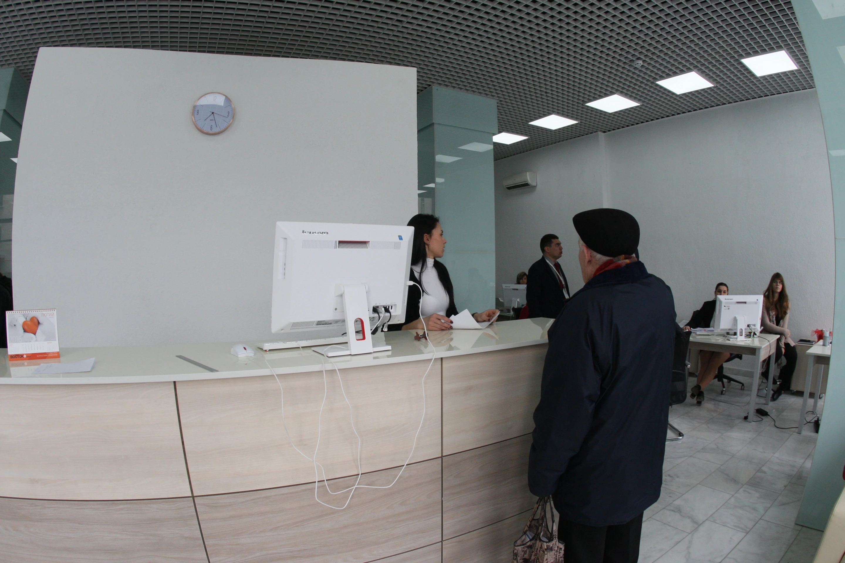 Public reception office — the reception desk and glazed public interior. Retained photograph, 2018.