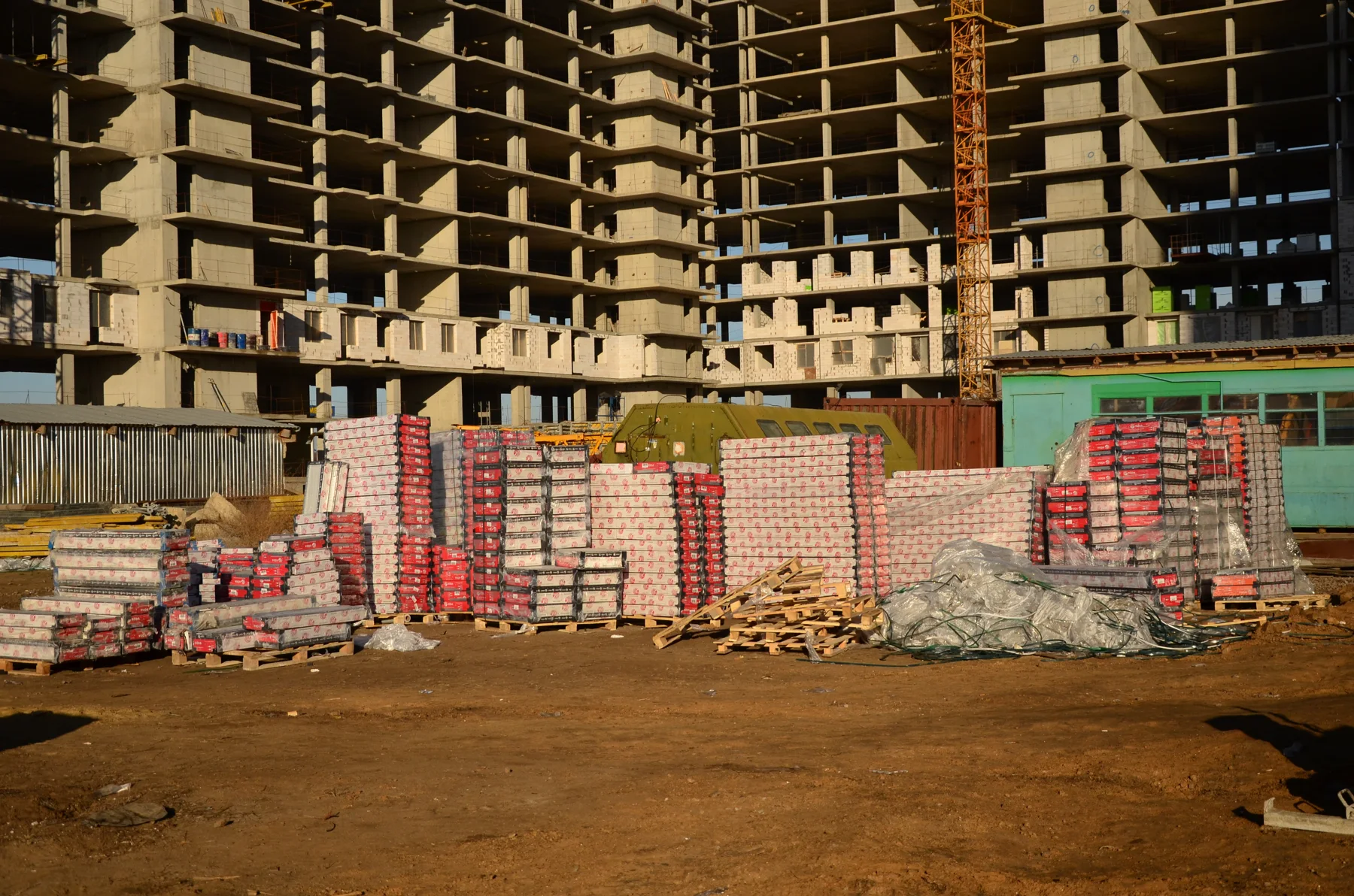 Phased residential site: formwork stored in front of the concrete frame. Owner-identified archive, 20 December 2013.