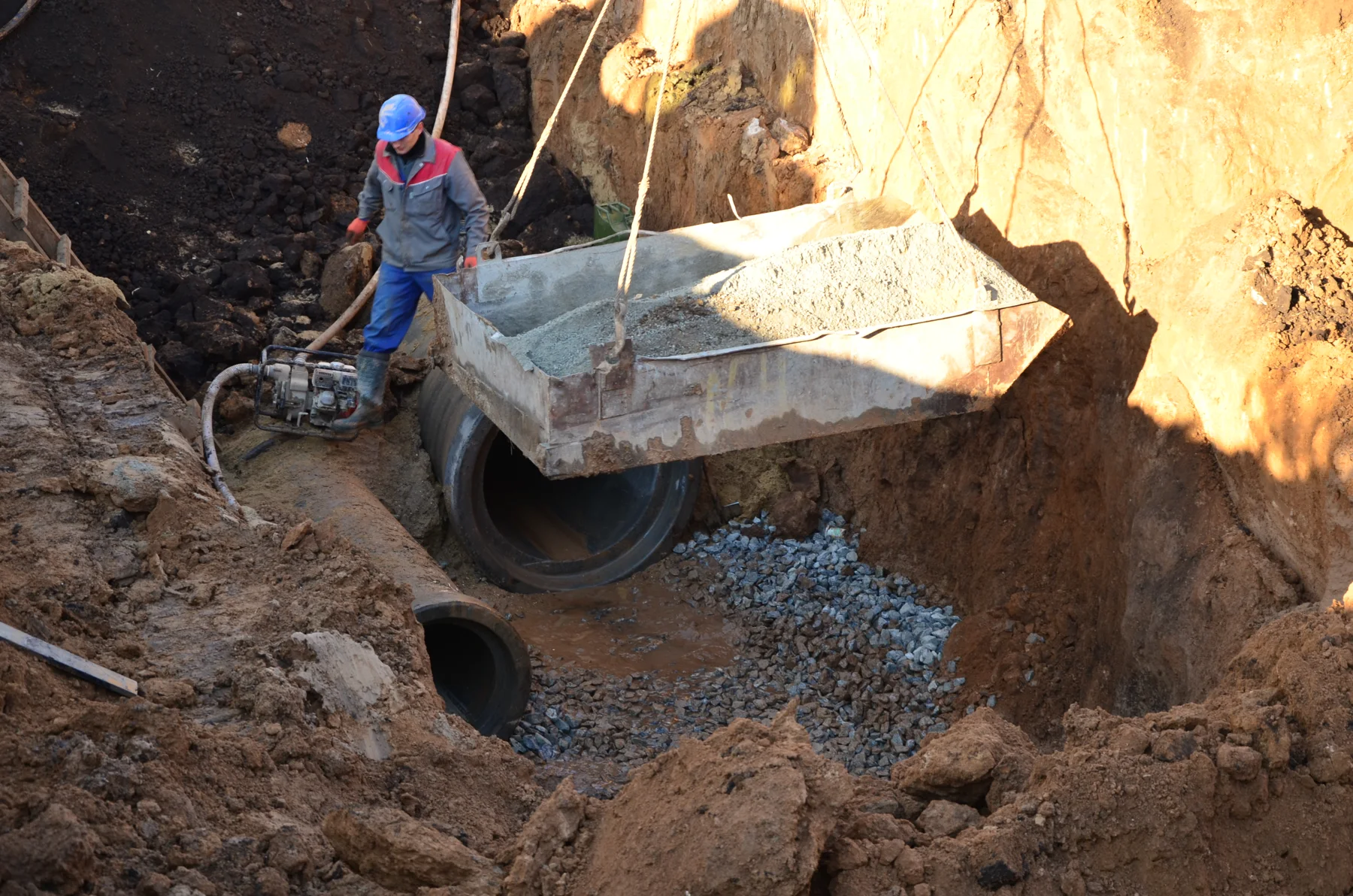 Phased residential site: service trench and pipe installation. Owner-identified archive, 20 December 2013.