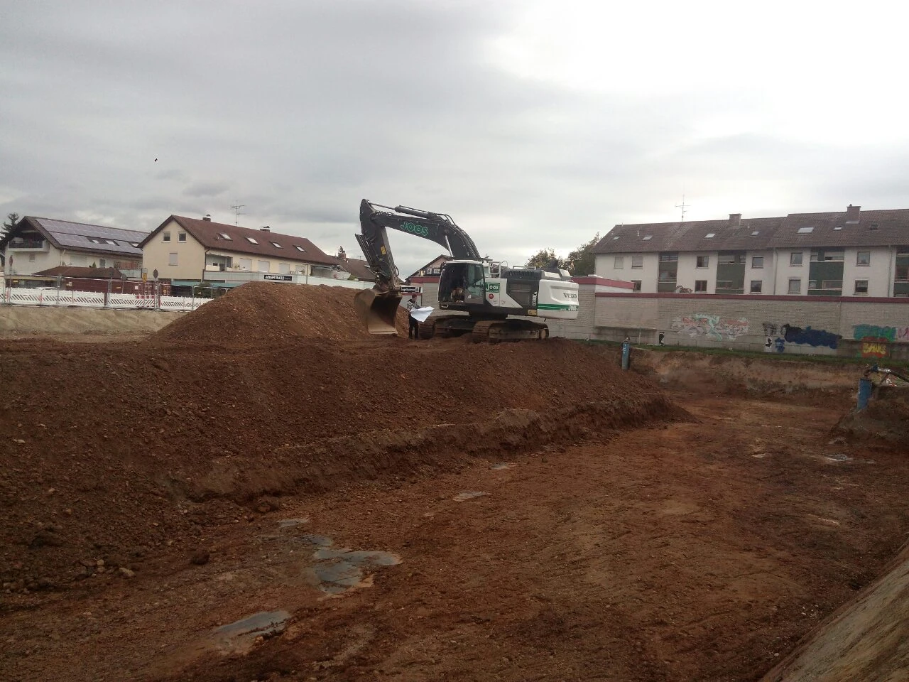 Teningen — earthworks across the residential construction site.