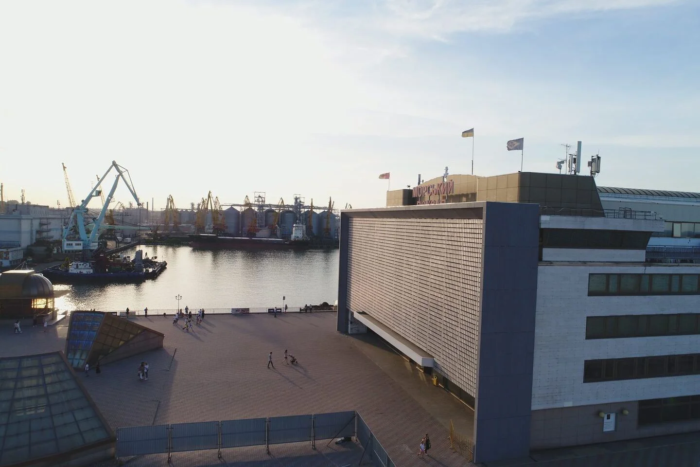 Marine passenger terminal: oblique view of the kinetic envelope against the port basin. FES project photograph.